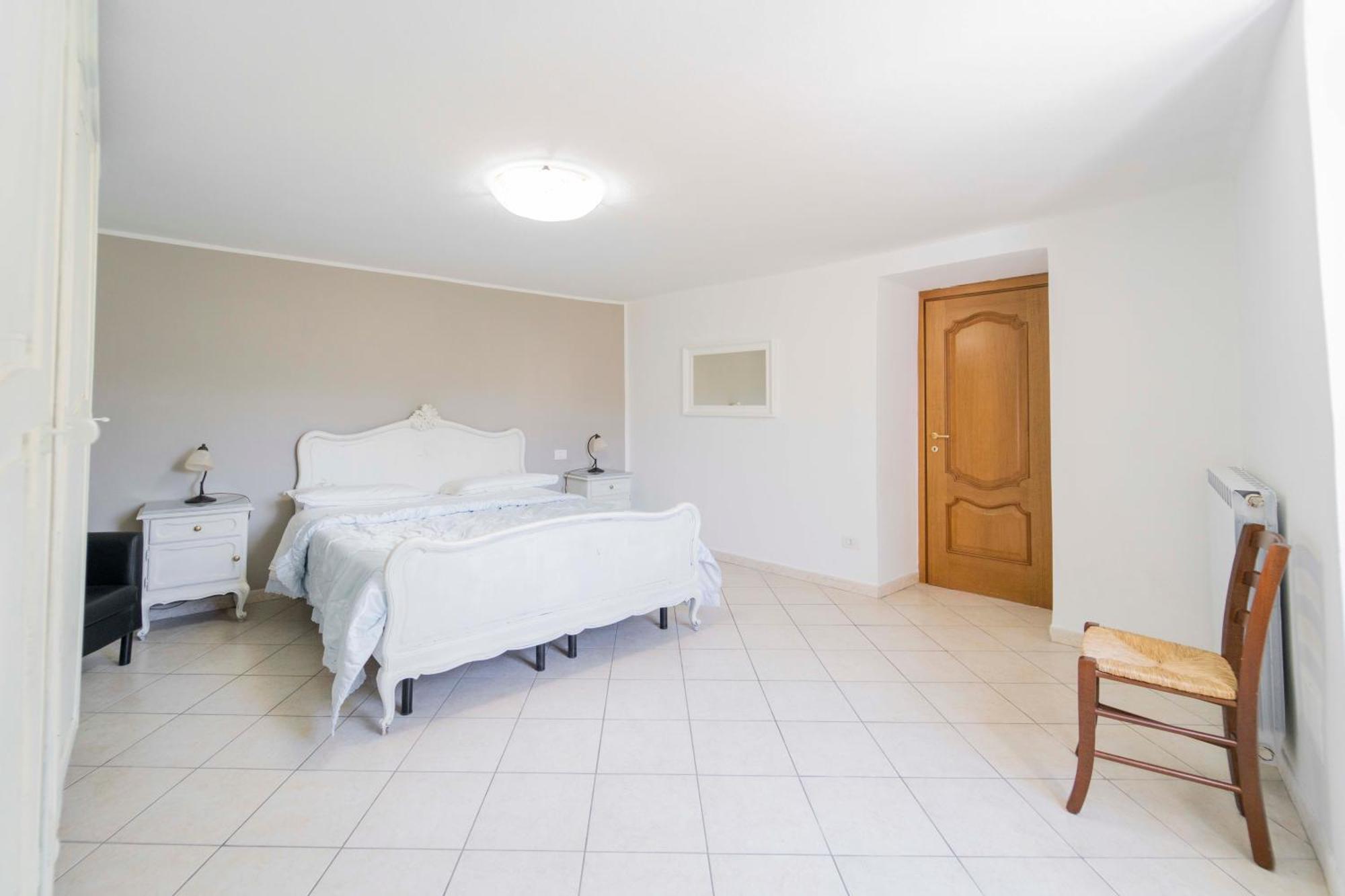 Casa Vacanza Il Portico Монеглия Стая снимка