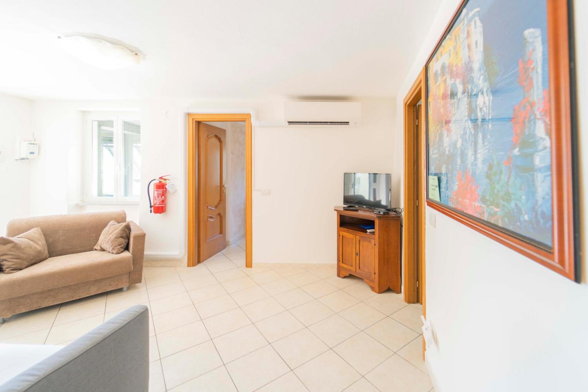 Casa Vacanza Il Portico Монеглия Стая снимка