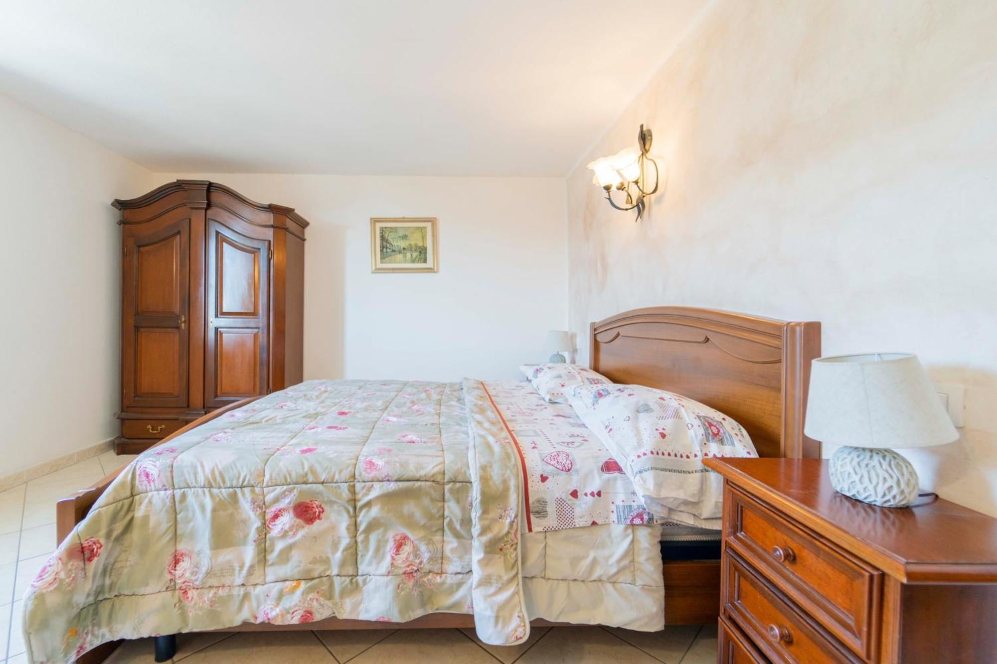 Casa Vacanza Il Portico Монеглия Стая снимка